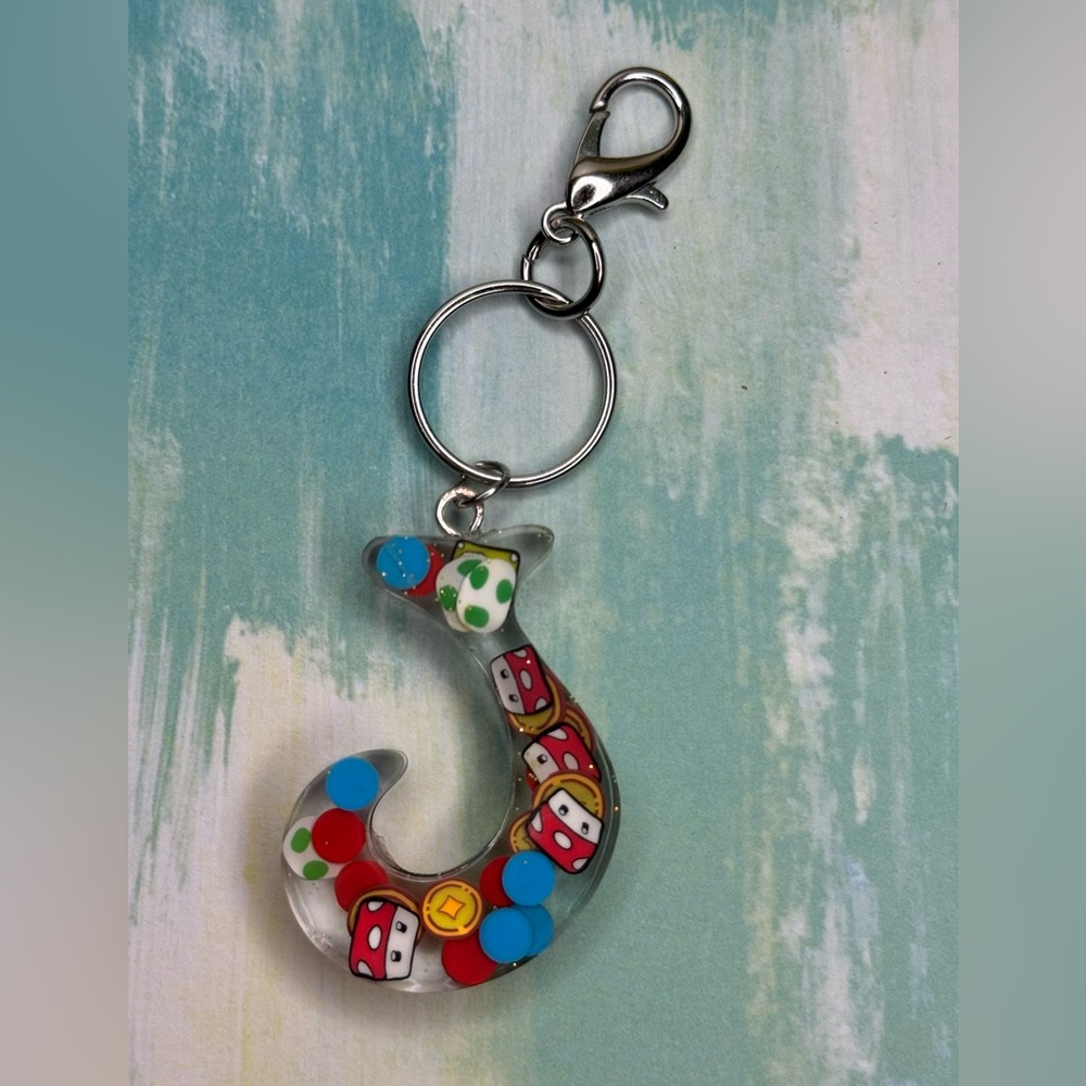 Letter J with video game inspired charms newly made.